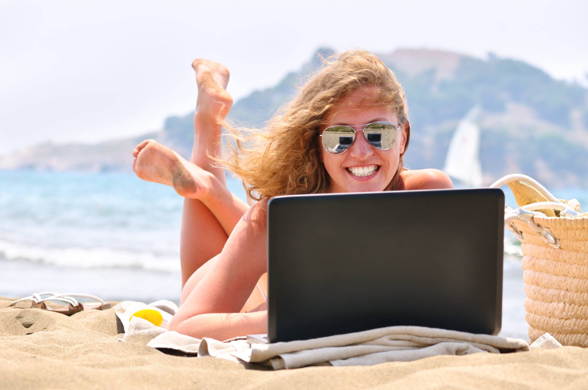 California or New York Business Woman working remotely from Florida Beach as Florida Resident